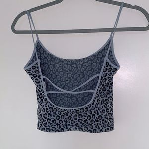 Open back // blue cheetah shirt // from etiquette boutique SIZE small